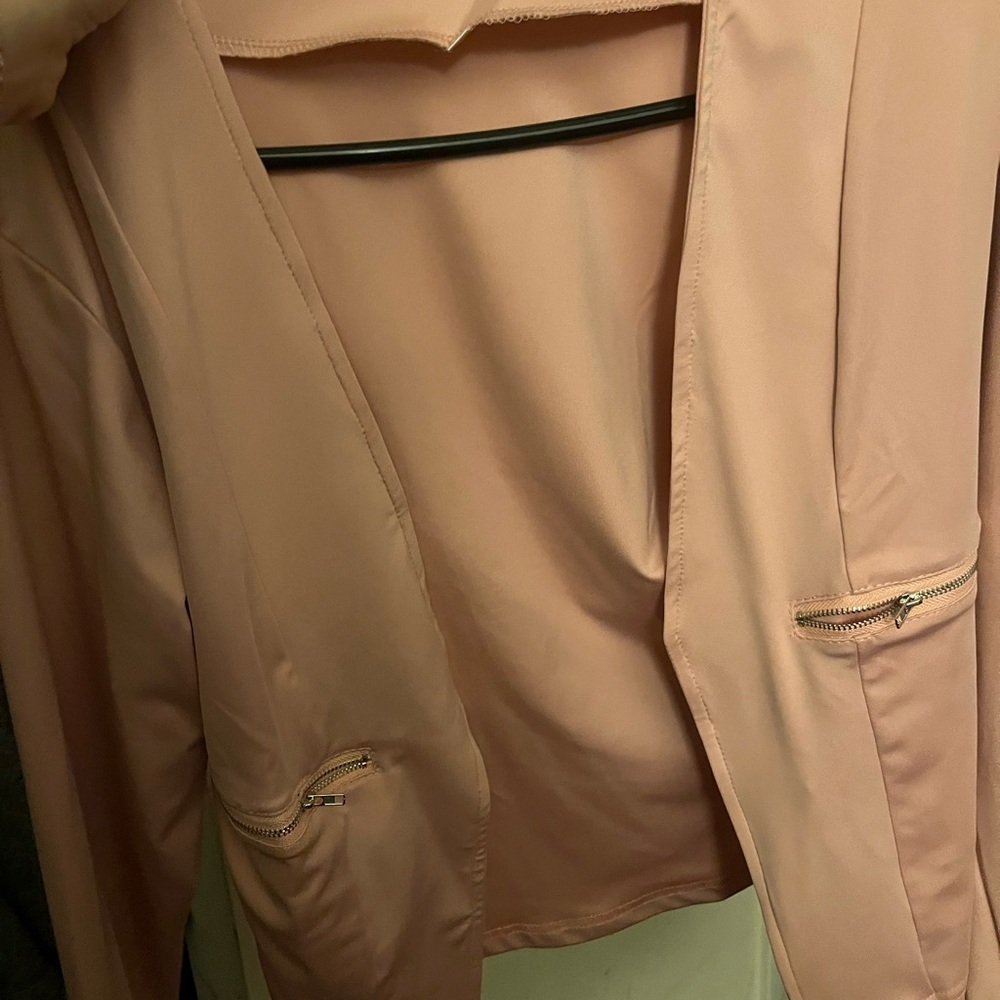Pink blazer it’s new without tags